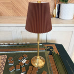 Henley Brass Table Lamp with brown pleated shade and brass base styled for a Mahjong table