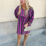 Mini dress in pink and green tartan plaid with balloon sleeves and collared v-neck