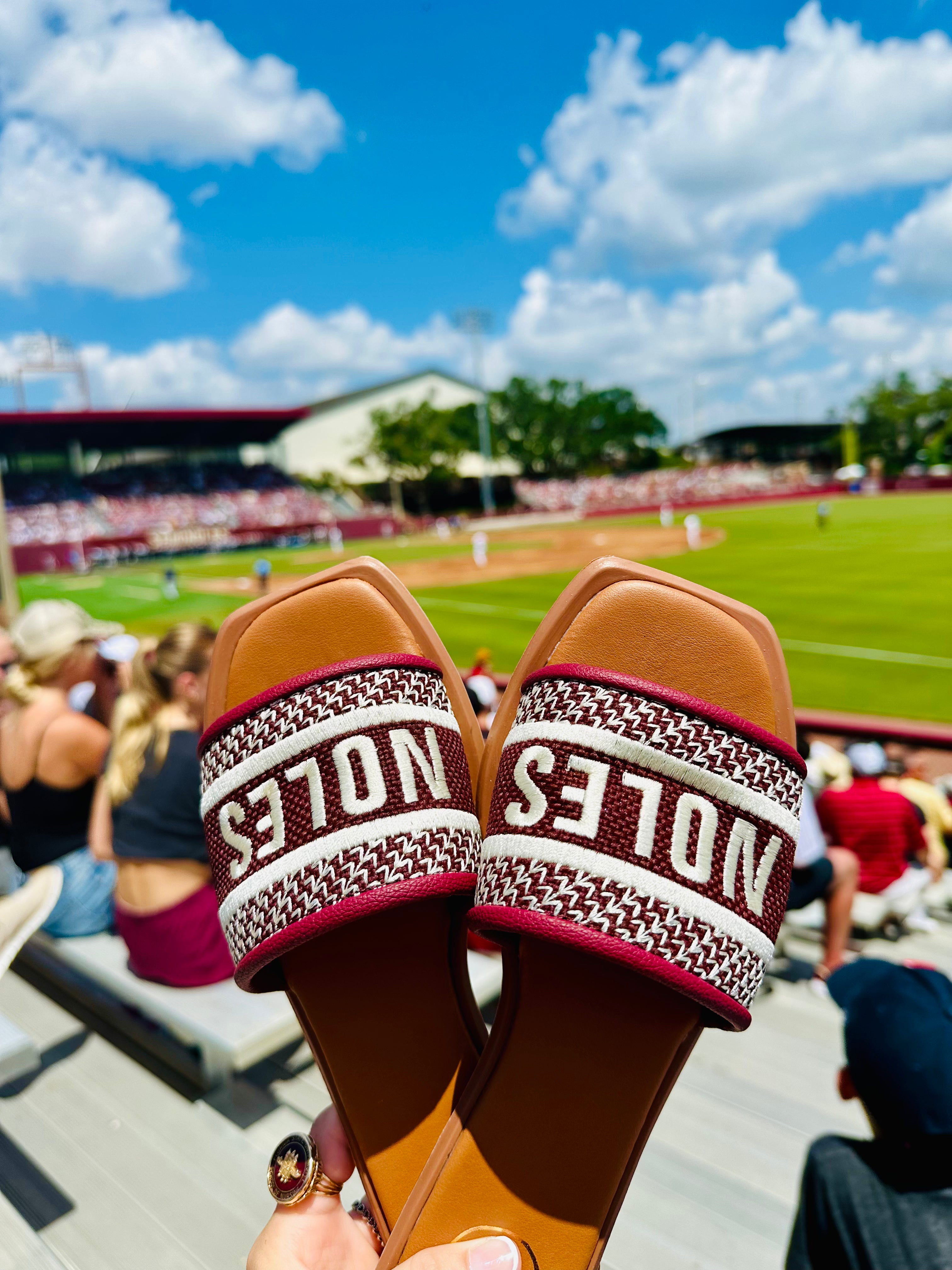 Garnet slip-on sandals with embroidered Seminole-inspired detailing and an open-toe design