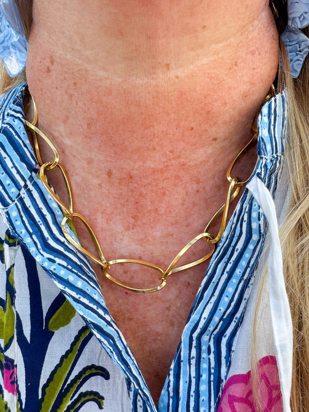 Gold chainlink necklace with large, thin links—elegant, modern, and ideal for layering.