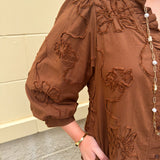 The Bloom Haven 3D Floral Mini Dress in Brown