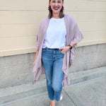 Mauve ruffle duster cardigan with open front and ruffled detailing along sides and sleeves.