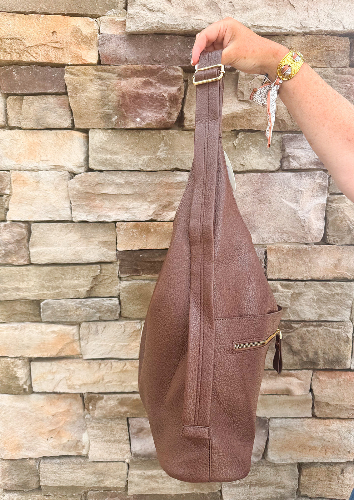 Chocolate slouchy hobo bag with double front zippers and gold hardware