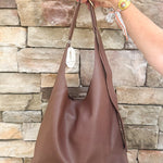 Chocolate slouchy hobo bag with double front zippers and gold hardware