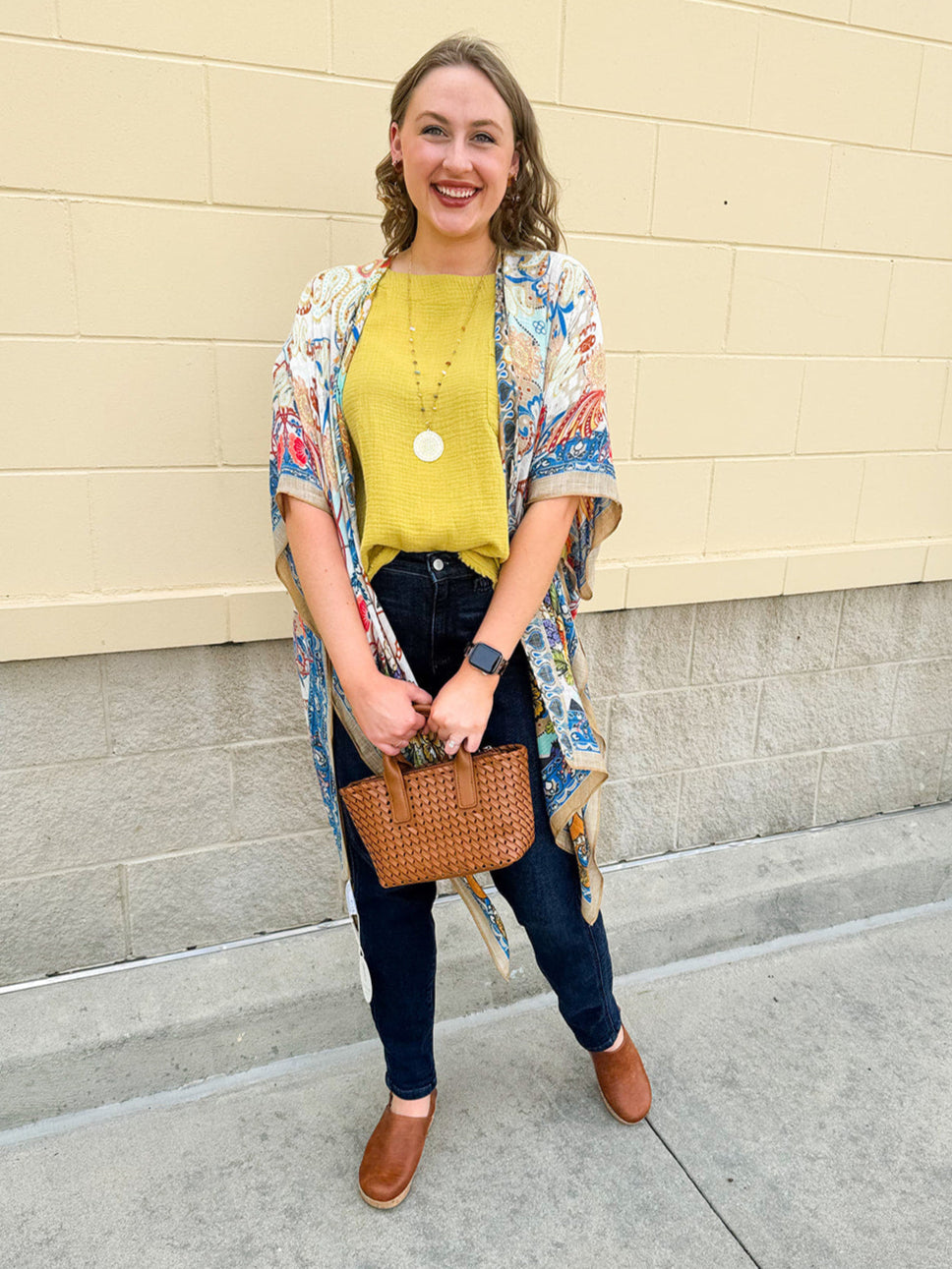 Vacay on the Mind Mandala Kimono with vibrant mandala, paisley, and floral prints, featuring open slits and lightweight flowy fabric.
