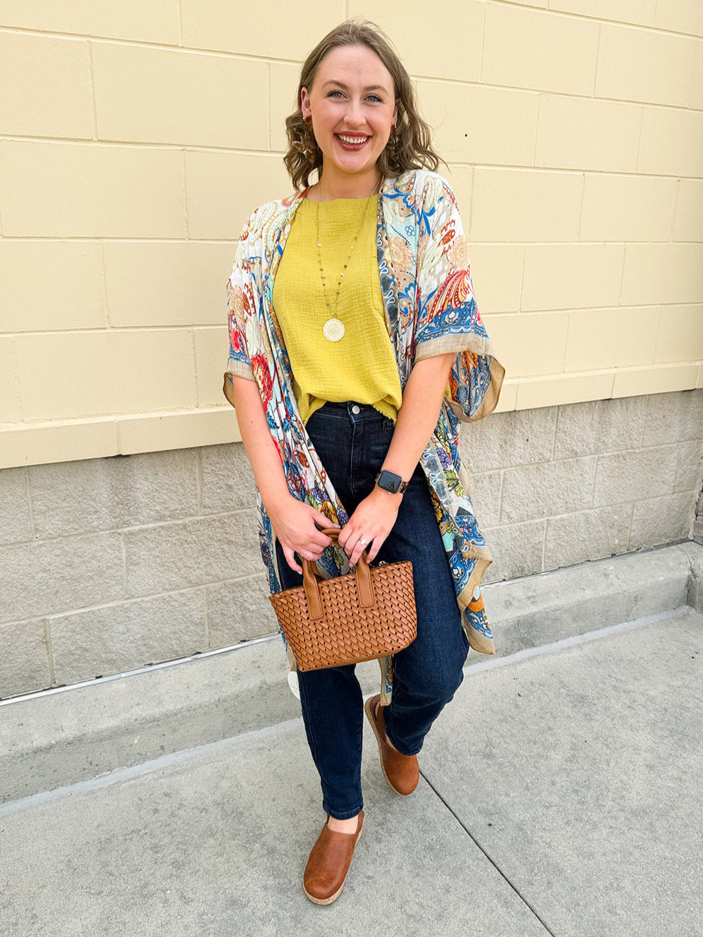 Vacay on the Mind Mandala Kimono with vibrant mandala, paisley, and floral prints, featuring open slits and lightweight flowy fabric.