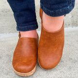 Corky’s Low Temps Rust Clogs with cork wedge, vegan leather upper, closed toe, and ankle strap.