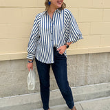 Lightweight striped button-down top in midnight blue and cream with ¾ pirate sleeves, styled for a casual coastal look