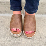 Bronze vegan leather wedge with peep toe, slide-in block heel, and multicolored cork sole