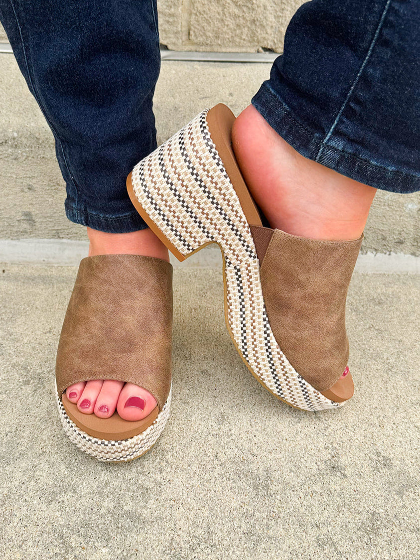 Bronze vegan leather wedge with peep toe, slide-in block heel, and multicolored cork sole