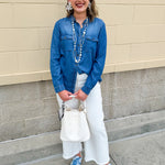 Light chambray button-down shirt with collar and chest pockets