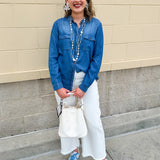 Light chambray button-down shirt with collar and chest pockets