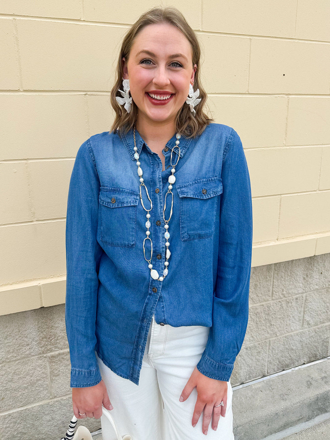 Light chambray button-down shirt with collar and chest pockets