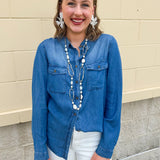 Light chambray button-down shirt with collar and chest pockets