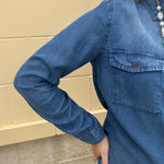Light chambray button-down shirt with collar and chest pockets