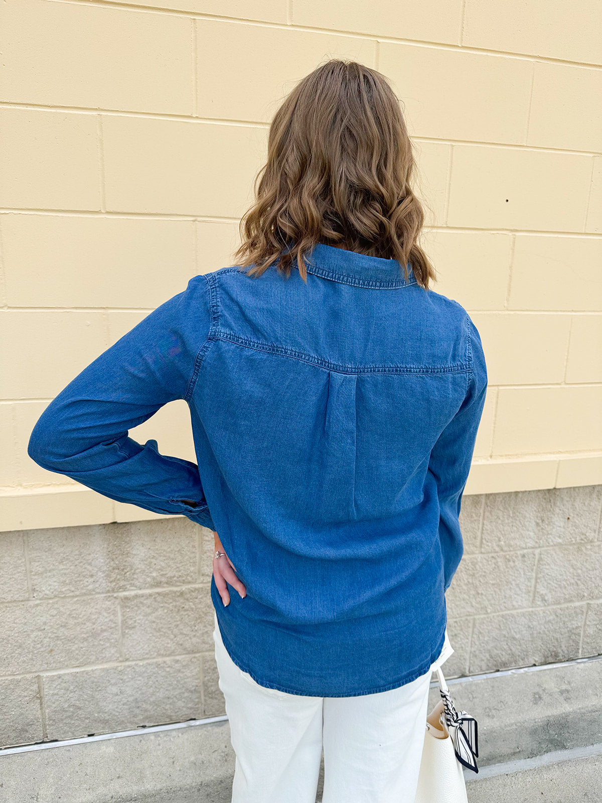 Light chambray button-down shirt with collar and chest pockets