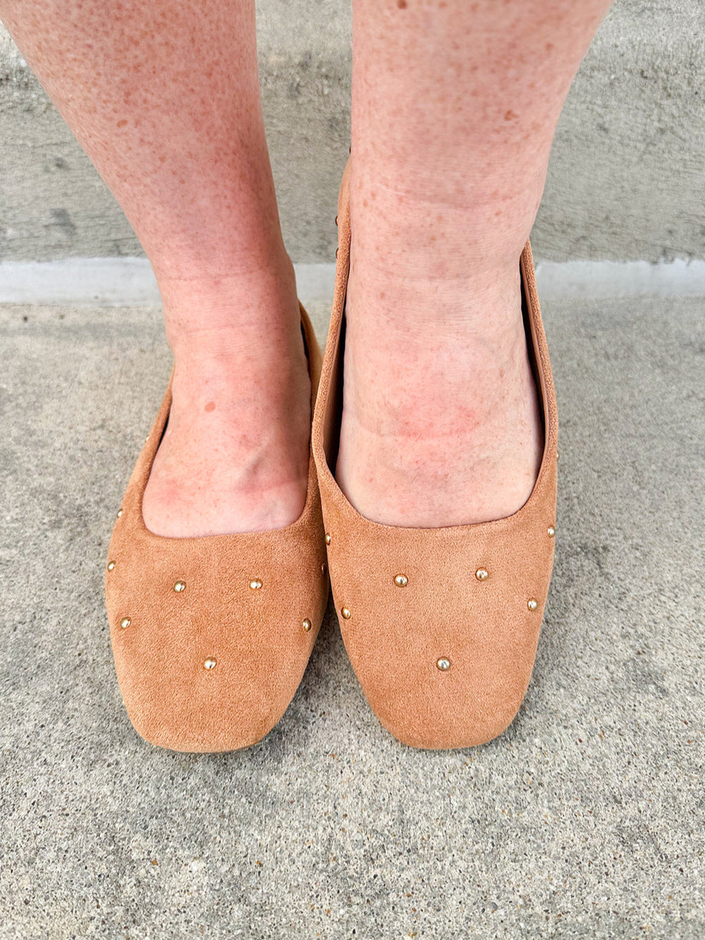 Corky’s Don’t Be Rude Flats in nude suede with gold studs, closed toe, and soft square toe design.