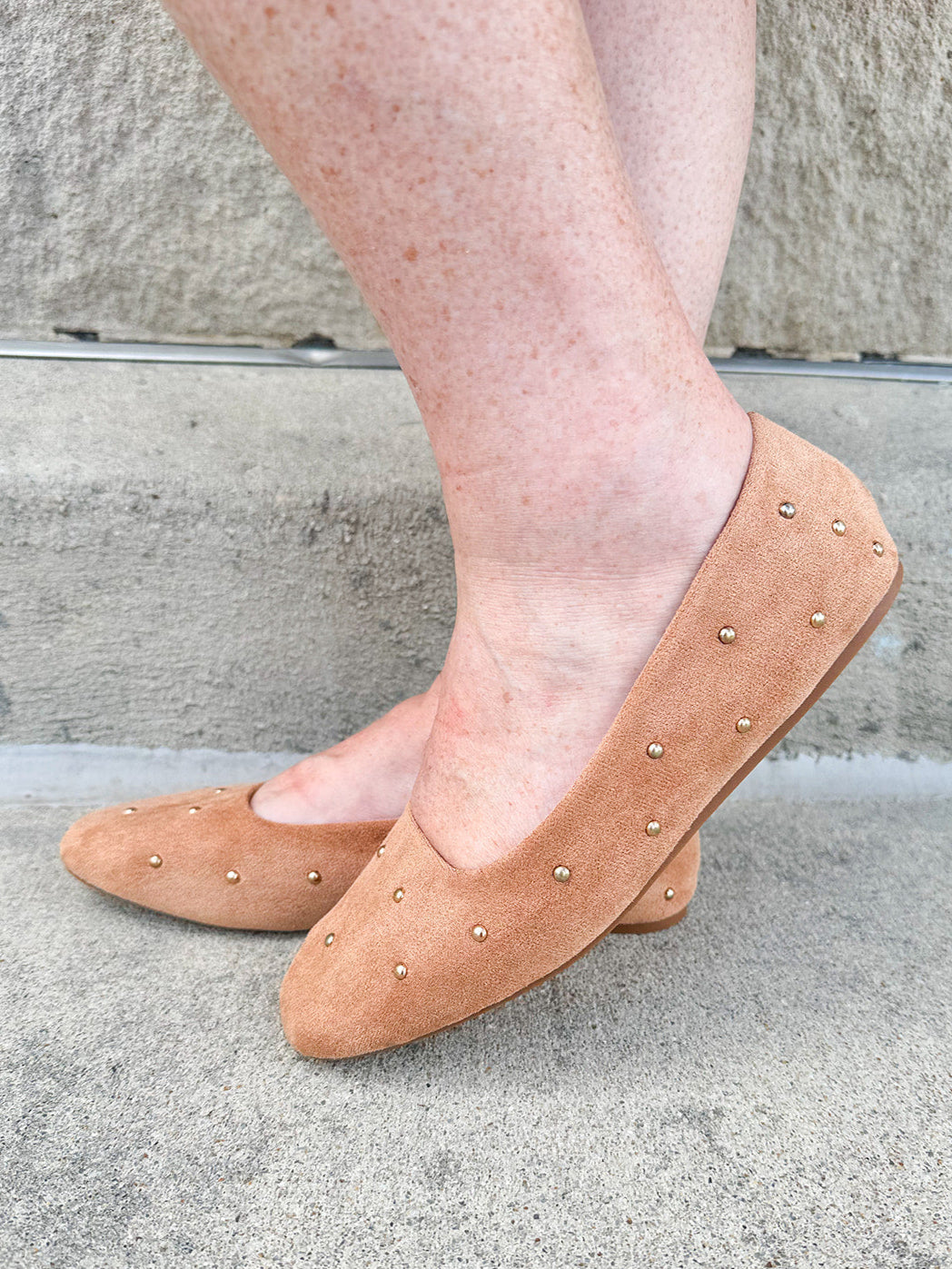 Corky’s Don’t Be Rude Flats in nude suede with gold studs, closed toe, and soft square toe design.