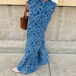 Medium wash wide-leg denim palazzo pants with chenille flower embroidery