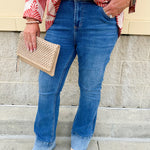 Dear John mid-rise bootcut jeans in Lagoon wash, styled with a neutral top
