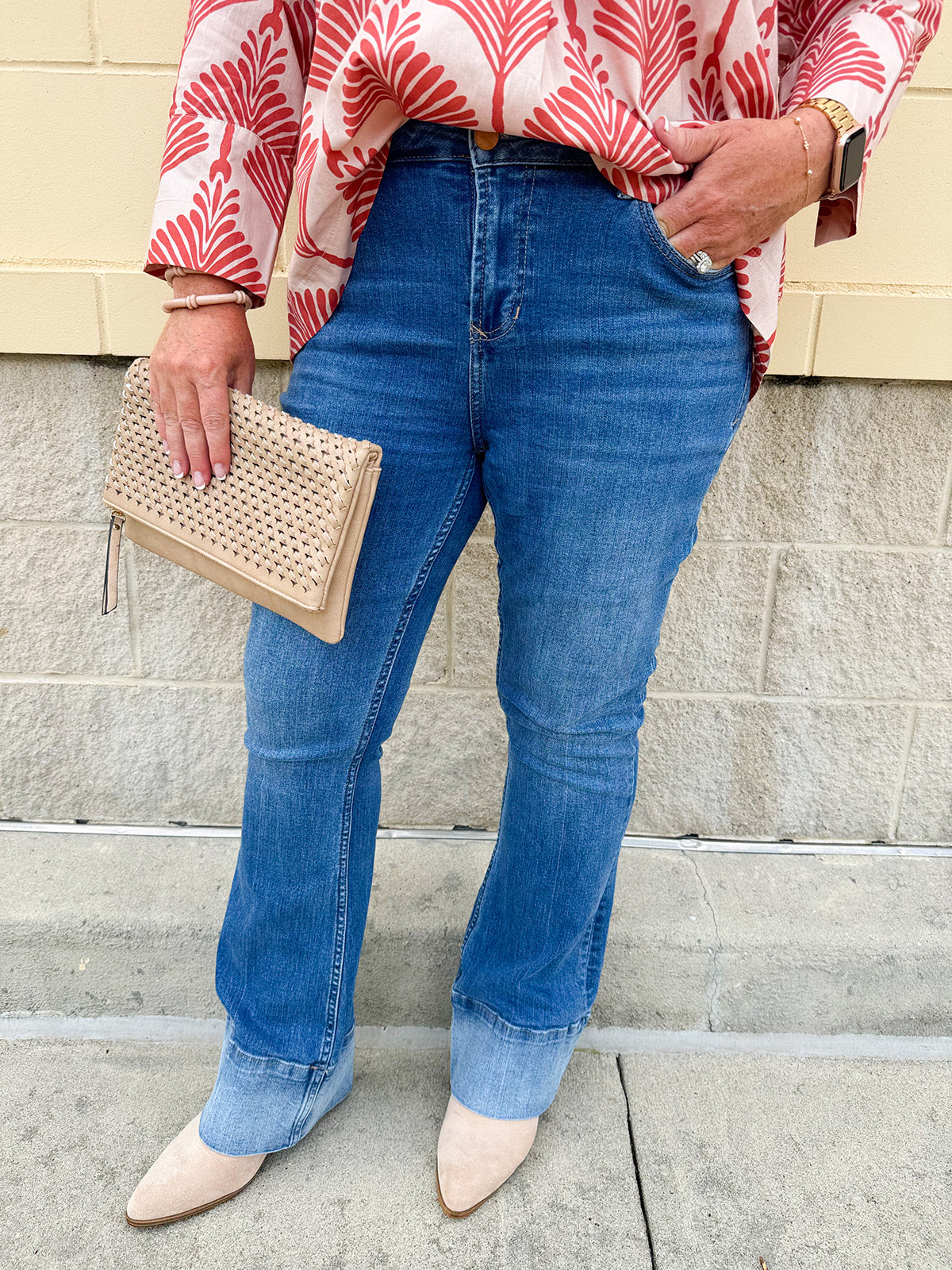 Dear John mid-rise bootcut jeans in Lagoon wash, styled with a neutral top