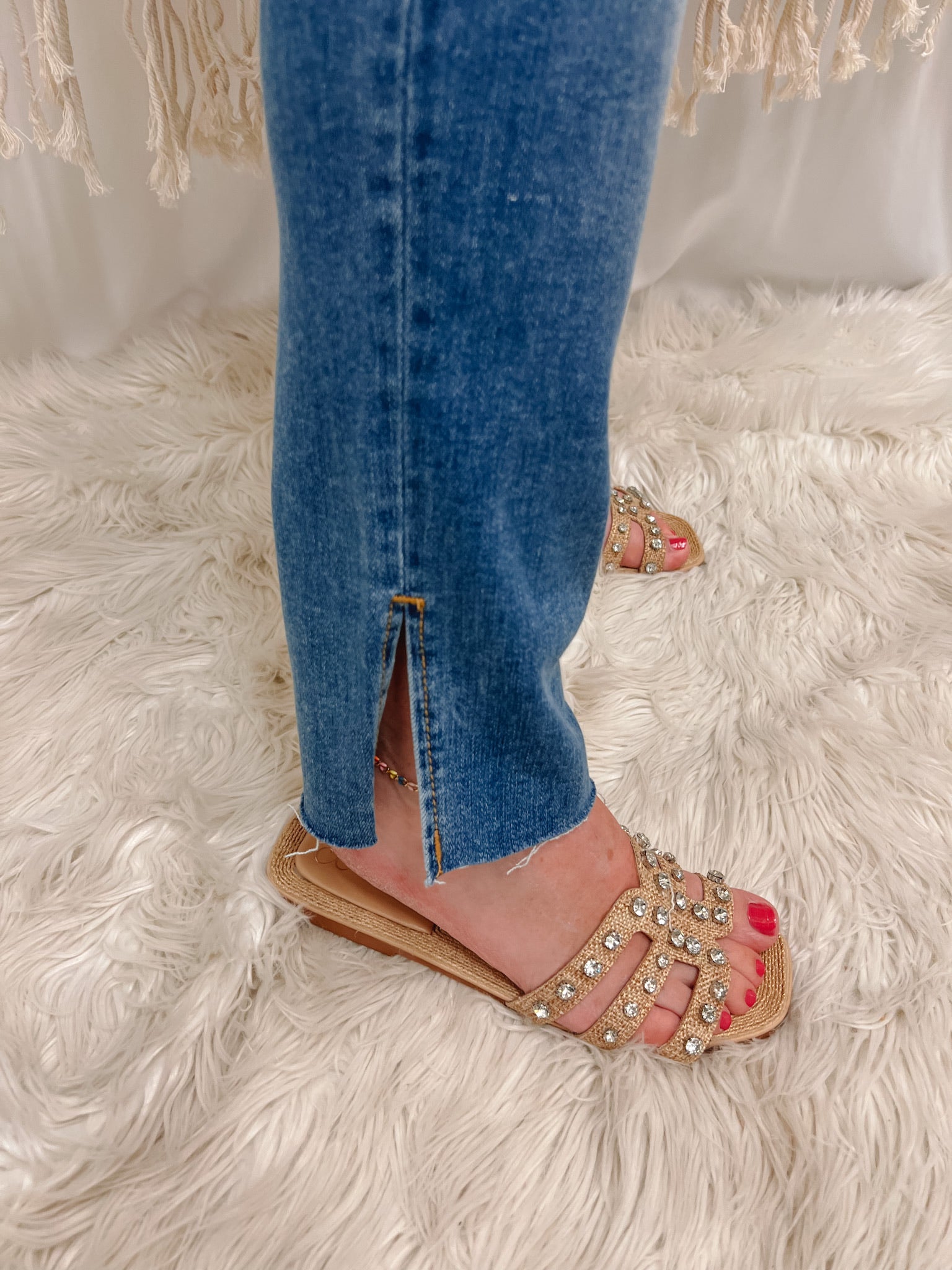 The Rowe High Rise Slit Skinny Jeans