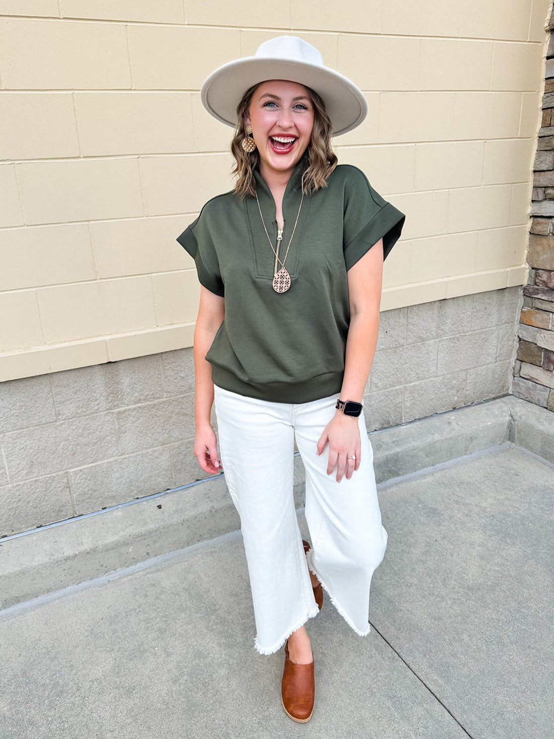 Dark olive high neck scuba vest with gold zipper