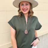 Dark olive high neck scuba vest with gold zipper