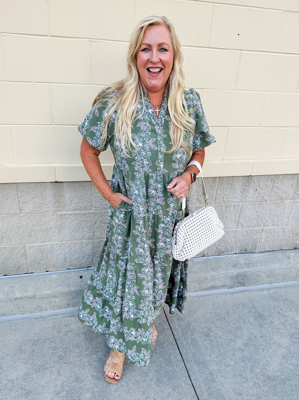 Green midi dress with white and pink floral print and short sleeves