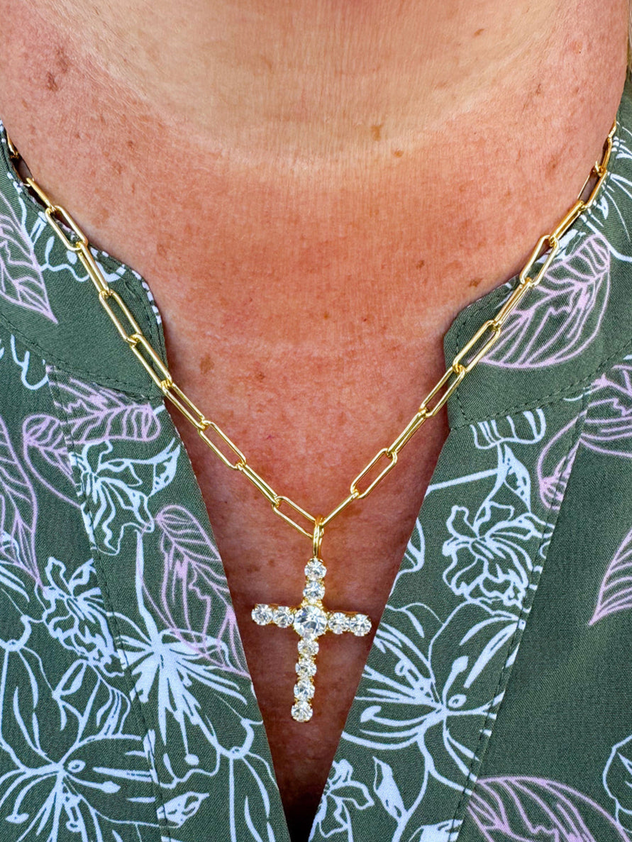 Bright gold-tone paperclip chain necklace with crystal-embellished cross pendant from Sorrelli’s Crystal Collection.