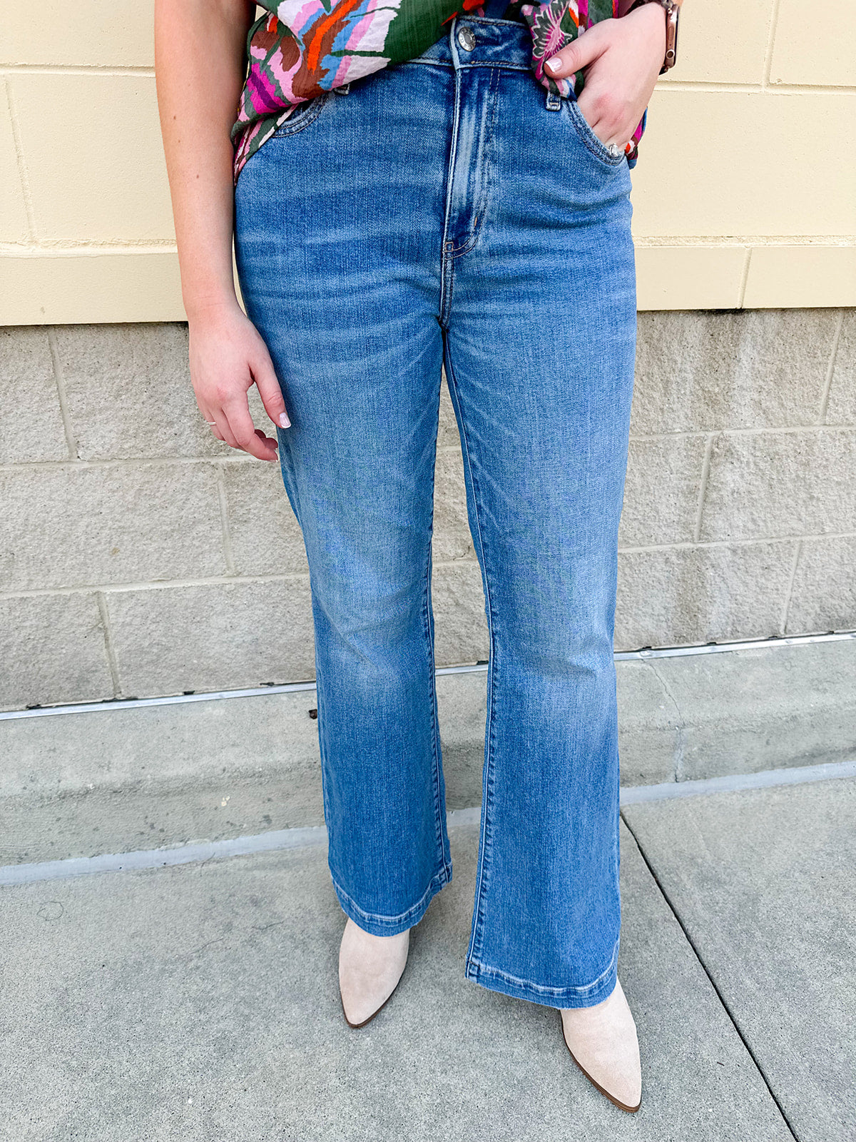 Midrise flare jeans in a soft vintage wash with a full-length leg and flattering silhouette.