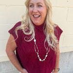 Garnet sleeveless mock neck knit sweater vest mid-length