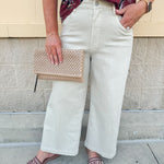 High-rise jeans in Dawn Khaki wash with clean hem