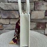 The Victory Lane Leather Clear Crossbody in Cream