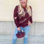 Garnet sweater with gold 3-d FSU detailing