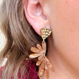 Bronze statement drop earrings with a fall-inspired design.