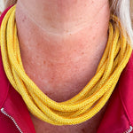 Gold rope-style necklace with clasp