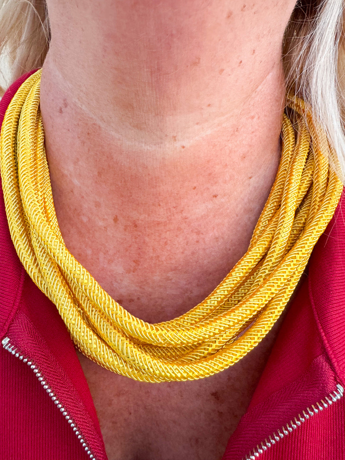 Gold rope-style necklace with clasp