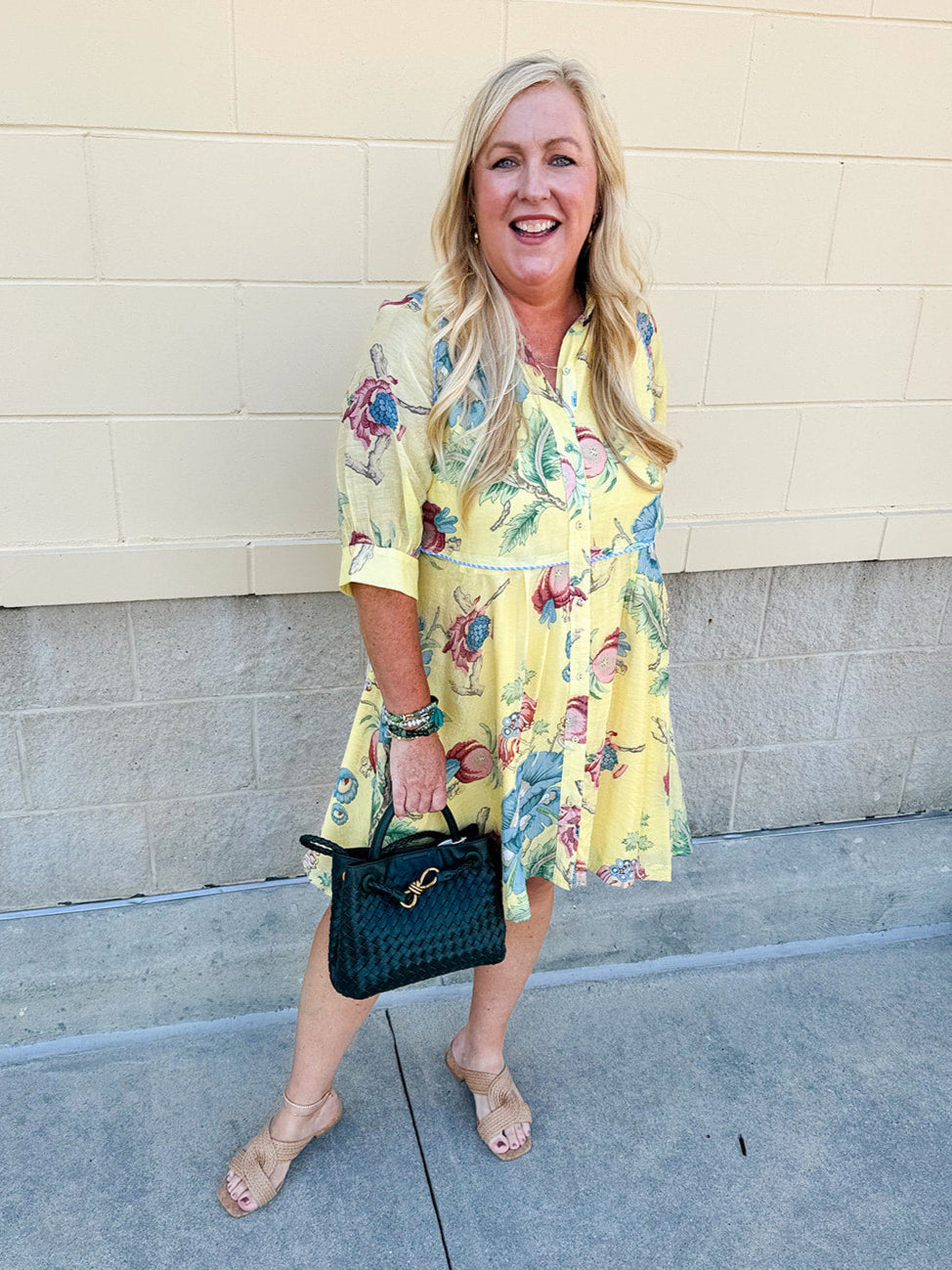Butter yellow mini shirt dress with button-down front, collar, ¾ sleeves, and striped piping details.