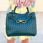 Forest green woven crossbody bag with gold hardware
