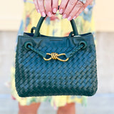 Forest green woven crossbody bag with gold hardware