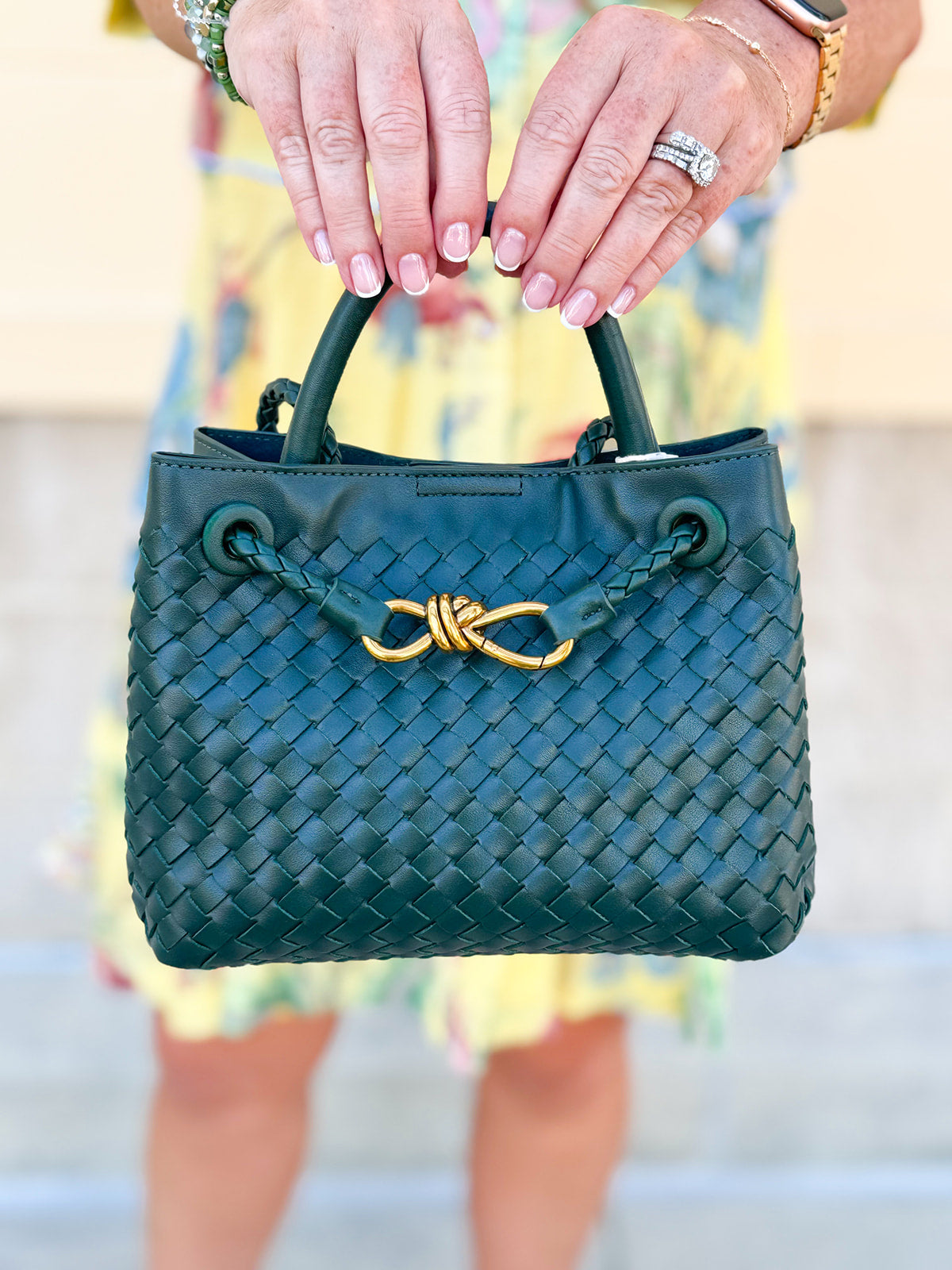 Forest green woven crossbody bag with gold hardware