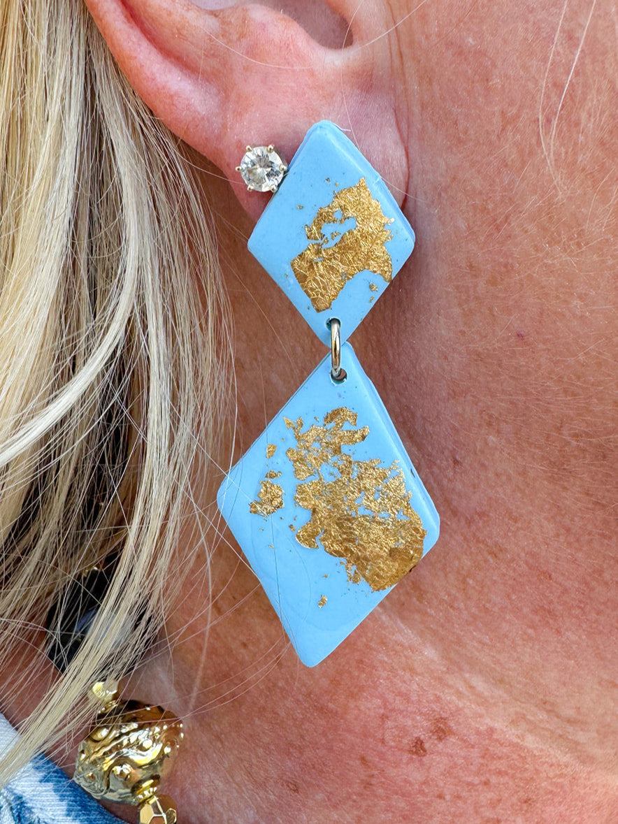 Light blue double diamond drop earrings with gold foil accents