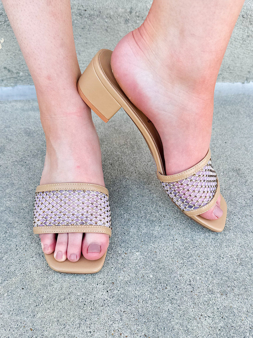 Rhinestone-studded slip-on heels with square toe, low block heel, and cushioned insole.