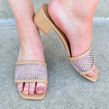 Rhinestone-studded slip-on heels with square toe, low block heel, and cushioned insole.