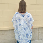 White oversized cotton top with navy seashell embroidery and drop shoulder design