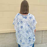 White oversized cotton top with navy seashell embroidery and drop shoulder design