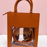 The Victory Lane Leather Clear Crossbody in Camel