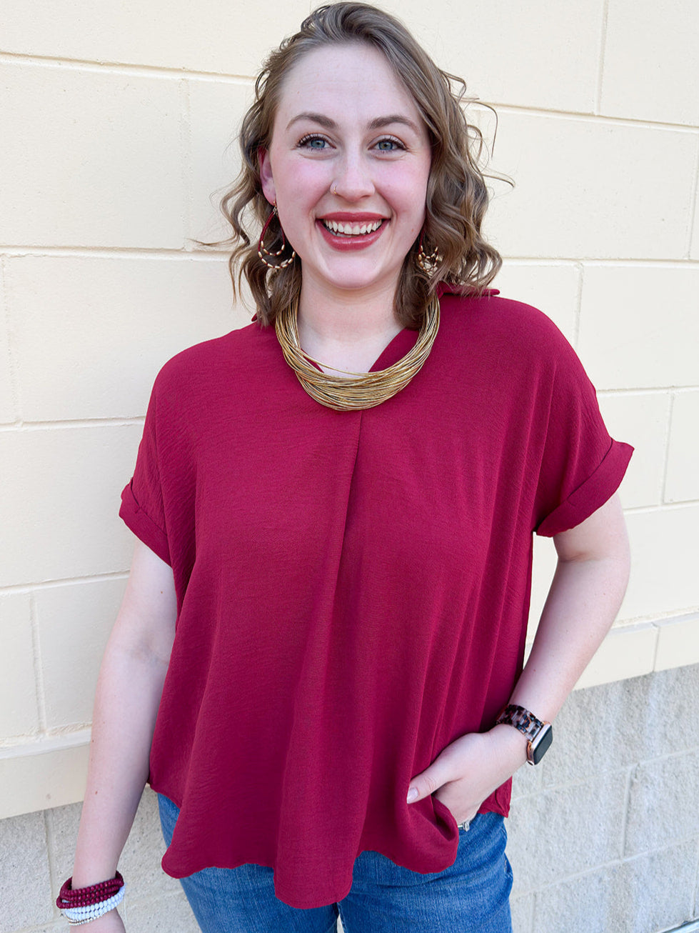 Garnet cap sleeve V-neck collared top Generous, flowy fit. Lightweight.