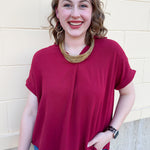 Garnet cap sleeve V-neck collared top Generous, flowy fit. Lightweight.